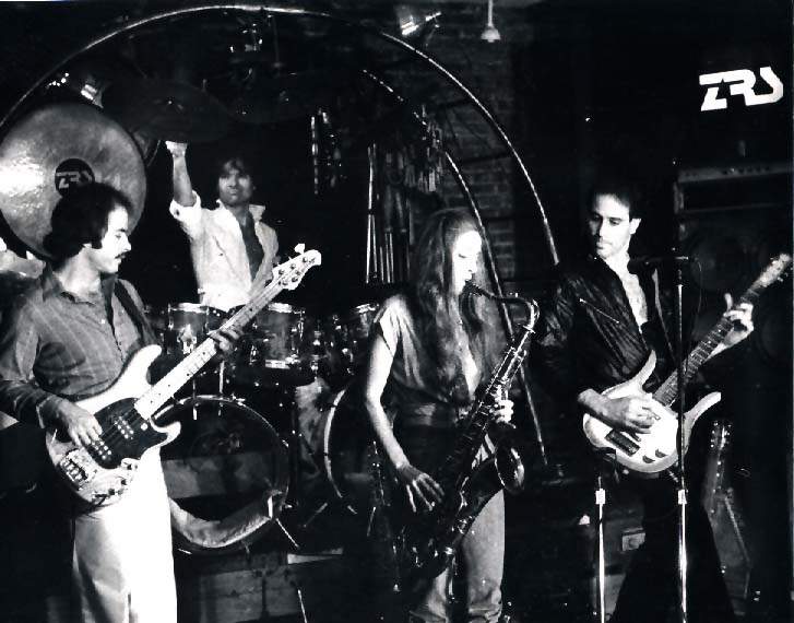 Lf to Rt:Even Steven Levee (bass); Minny Rose Zampino (sax); Rich Smith (drums); Larry Zampino (guitar) with ZRS Band (hudson Valley, NY 1983)
